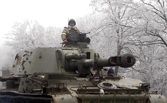 Українські військові почали відводити важке озброєння від лінії зіткнення