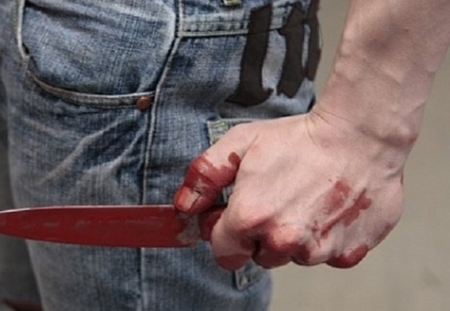 Німець порізав ножем 30-річну українку