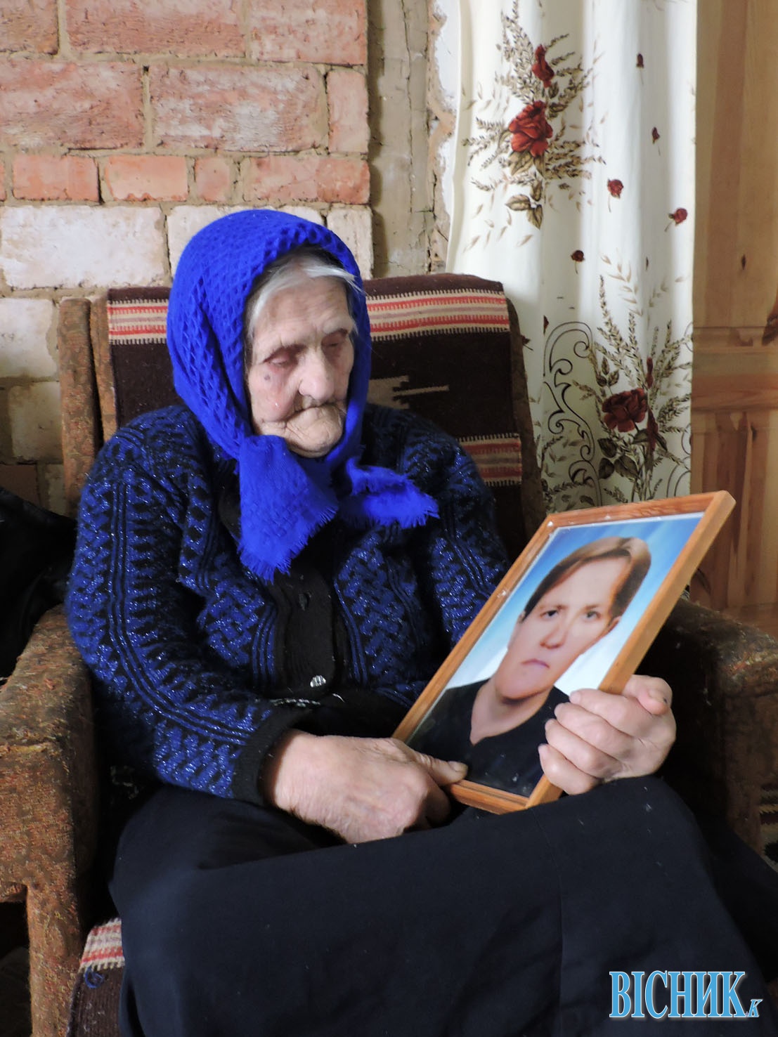 Анастасія КОРЕЦЬ з портретом дочки