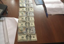 Волинська  юристка підбурила на злочин:  1000 доларів нотарісу за фіктивний документ