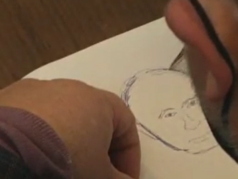 Депутат Львівської міськради під час сесії малював портрет Путіна