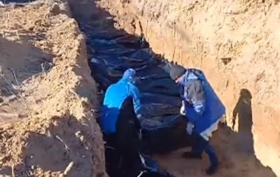 У Бучі 67 мирних жителів поховали у братській могилі