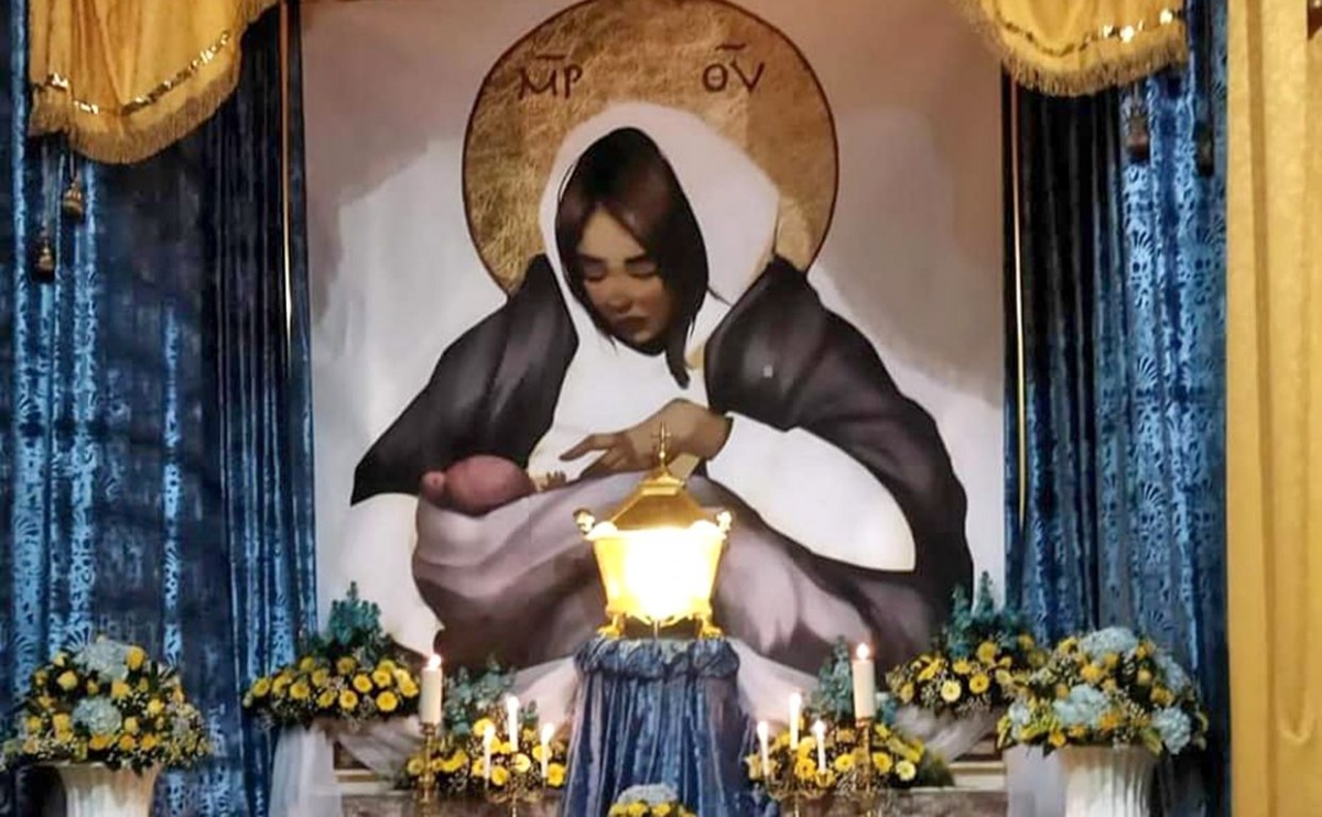 Образ киянки з немовлям у метро  став іконою у католицькому храмі в Італії
